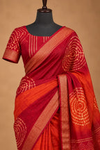 House Of Paramya maroon and orange ombre viscose vegan silk saree with gold zari border and bandhani mandala prints.