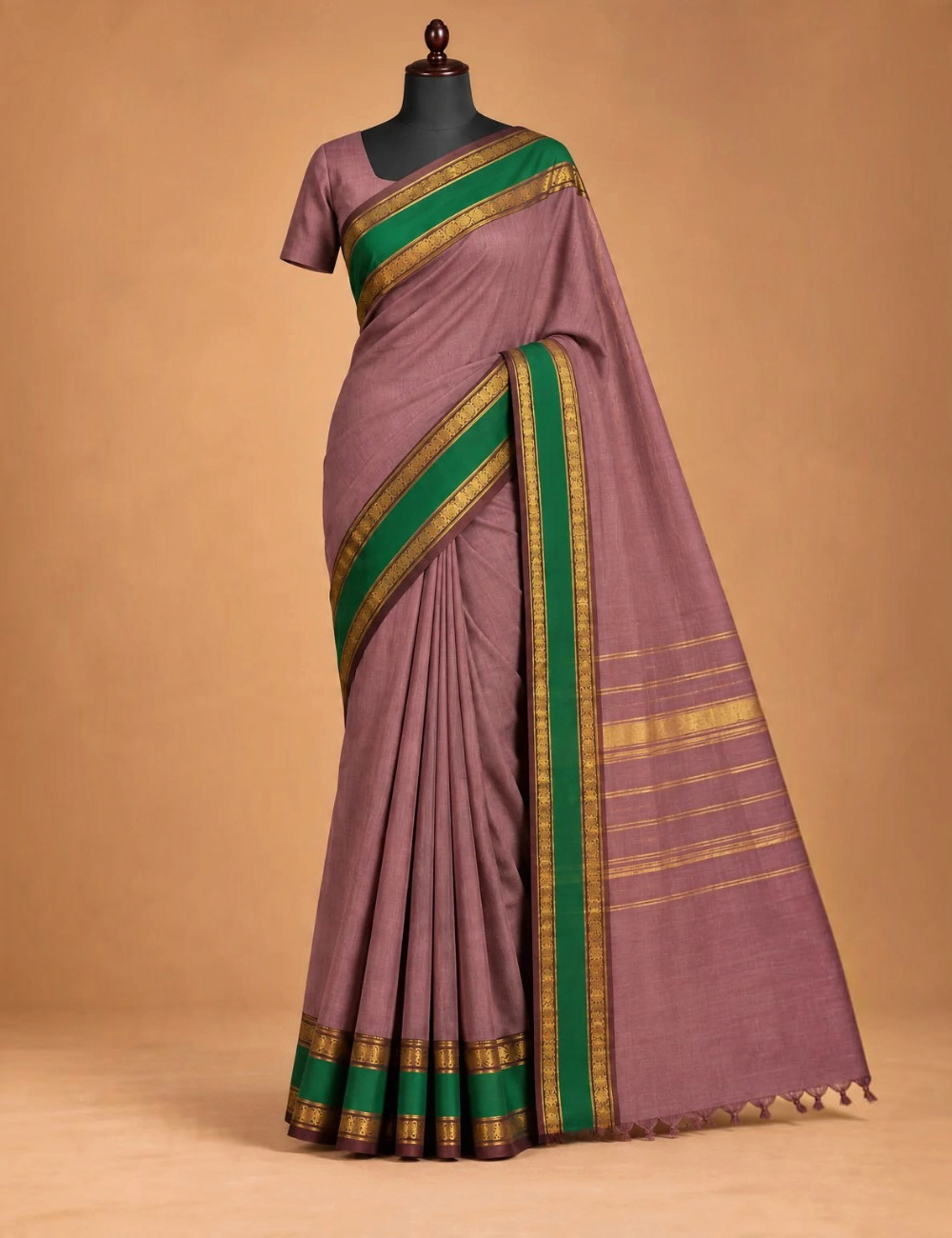House Of Paramya dusty mauve Chettinad cotton saree with contrast green pallu and gold zari peacock border on brown.