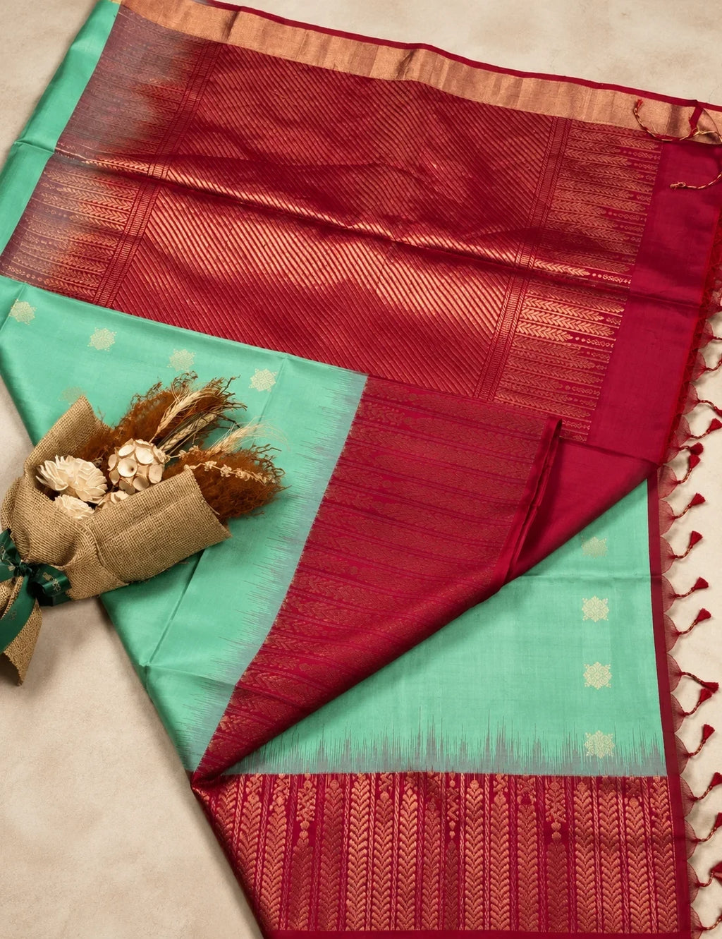 House Of Paramya mint green Kanchipuram silk saree with rani pink zari border and traditional woven pallu