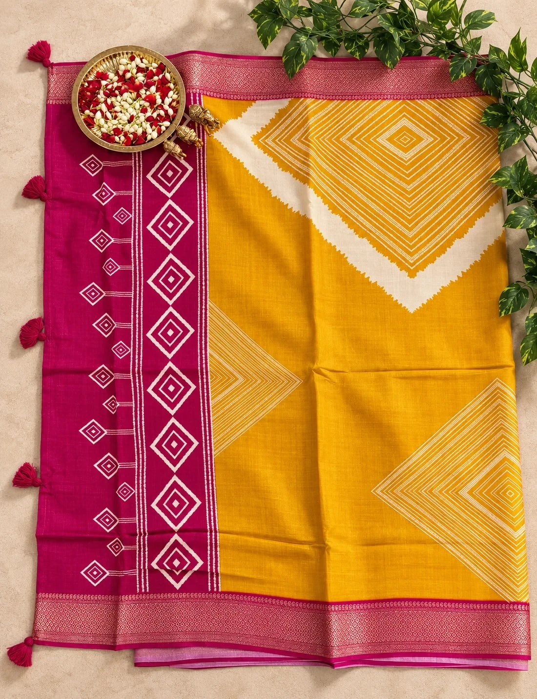 House Of Paramya mustard and magenta vegan silk saree with ikat diamond print and woven zari border with tassels.