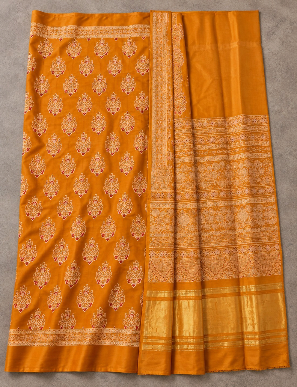 House Of Paramya mustard modal silk saree featuring intricate white and red Ajrakh block prints and a gold zari border.