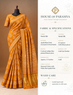 House Of Paramya mustard modal silk saree with red and white Ajrakh block print and a shimmering gold zari border.
