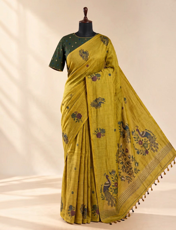House Of Paramya mustard olive Munga cotton saree with woven peacock and floral motifs and a deep green blouse piece.