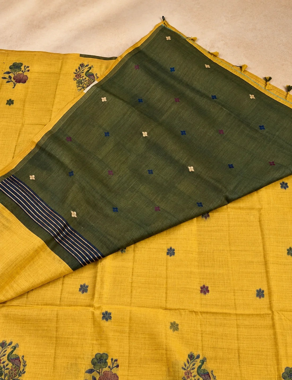 House Of Paramya mustard olive Munga cotton saree with woven peacock and floral motifs and deep green blouse piece