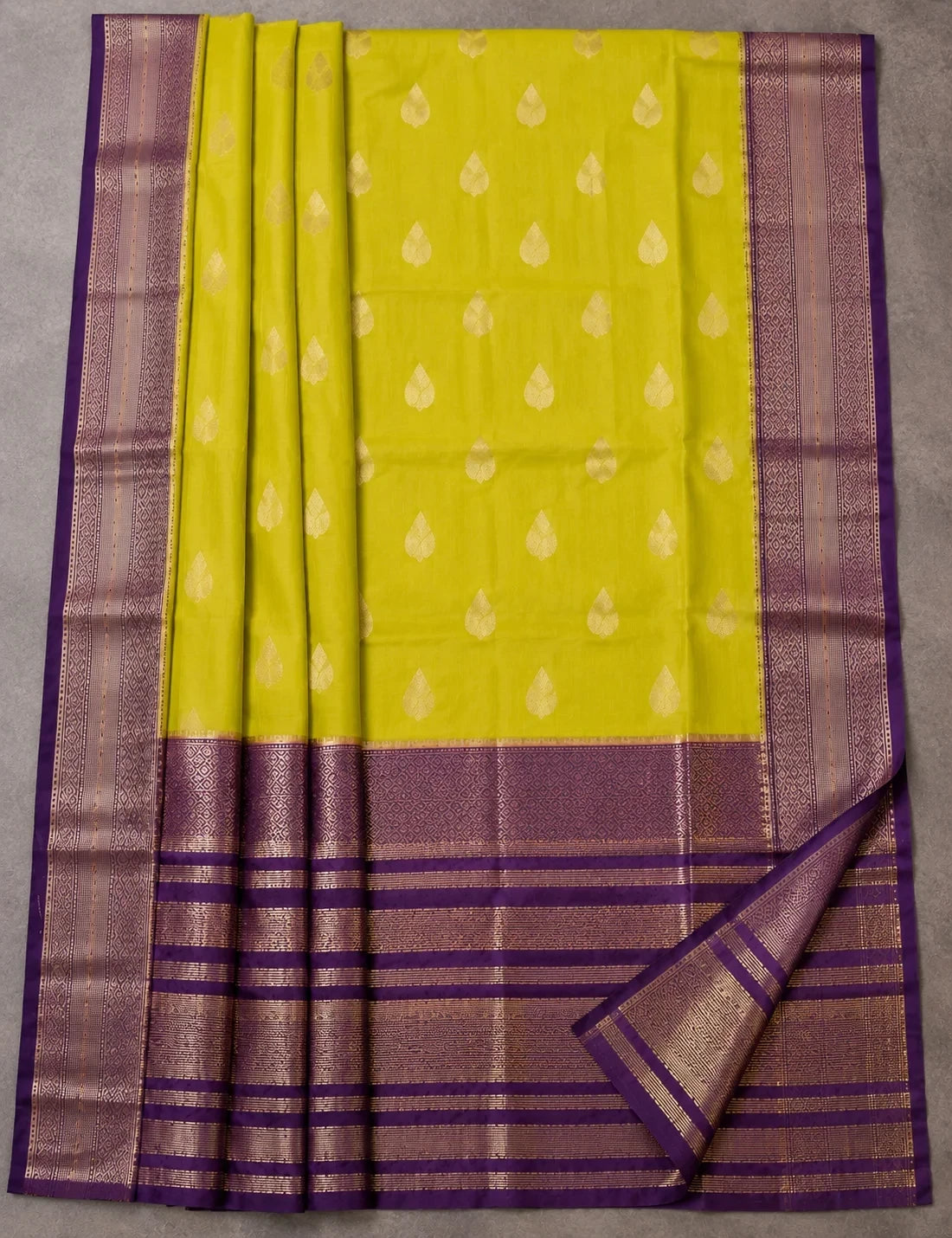 House Of Paramya mustard yellow Assam silk saree with gold leaf buti and purple border with silver-gold lattice weave