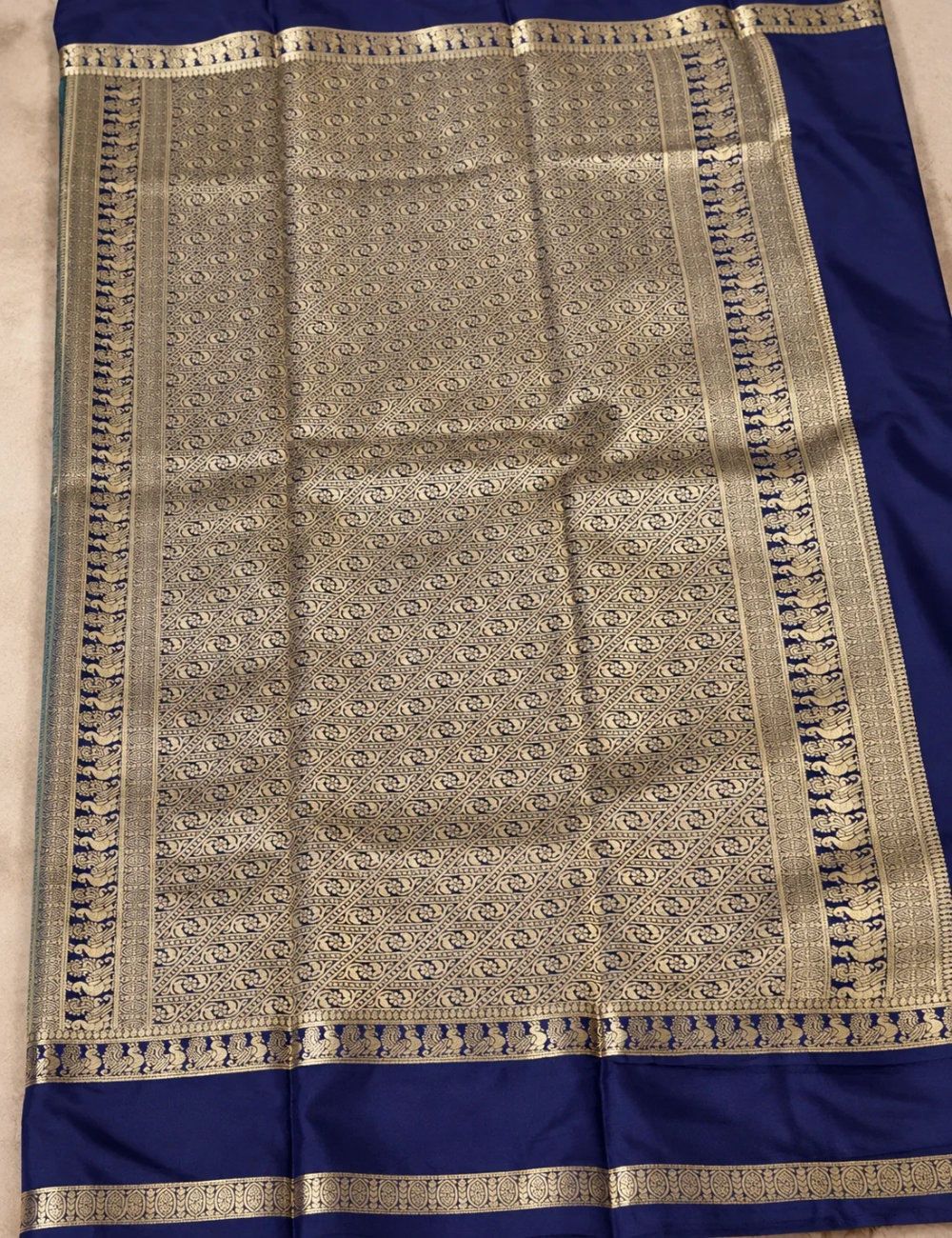 House Of Paramya azure and royal blue pure Mysore silk saree featuring a geometric zari weave and silver zari border.