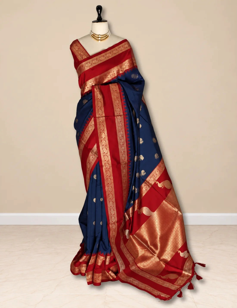 House Of Paramya navy blue semi soft silk saree with red zari border featuring elephant and peacock motifs