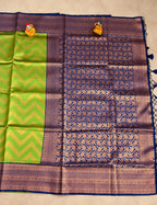 House Of Paramya navy blue semi Kanchipuram silk saree with woven leaf lattice and a contrasting green chevron pallu.