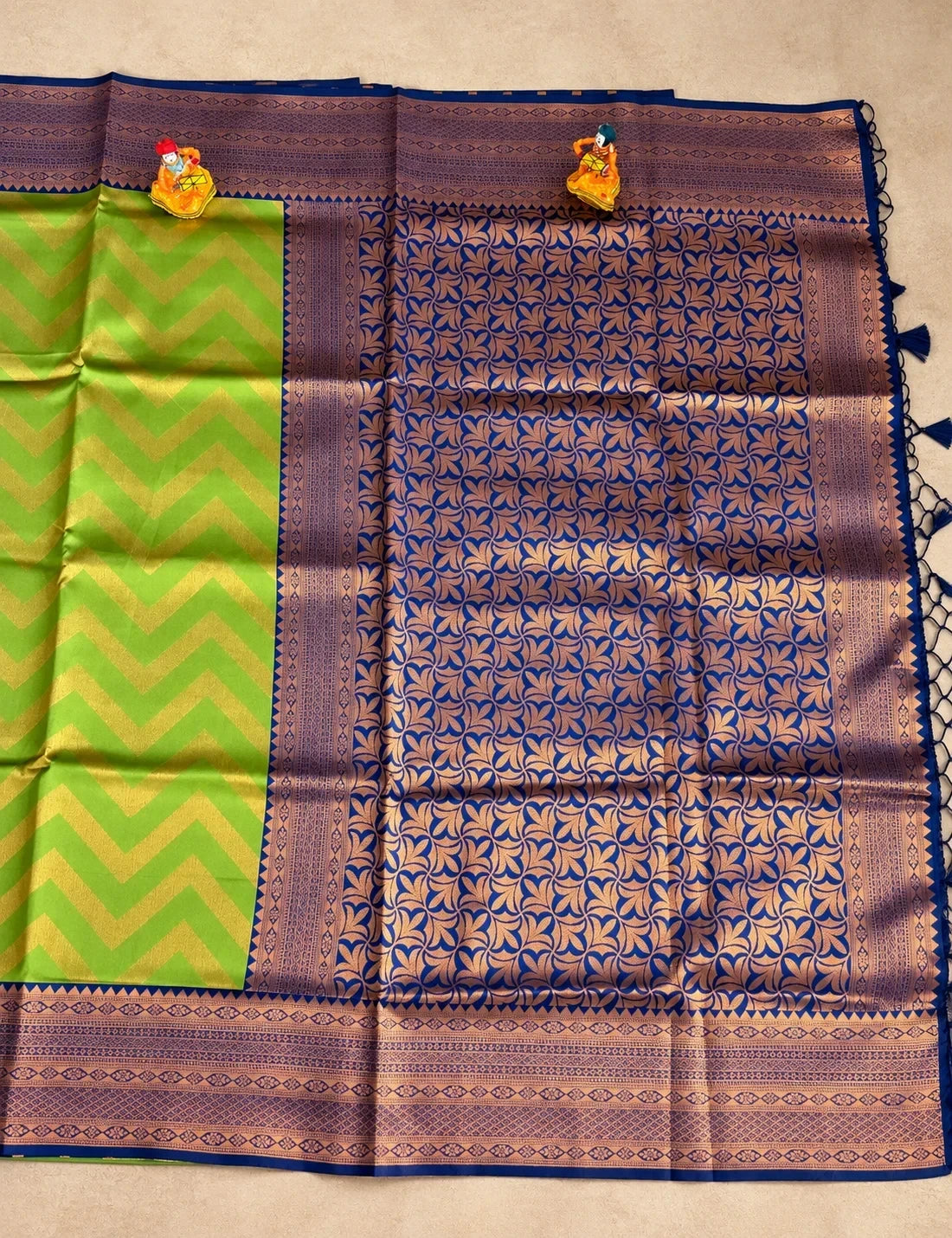 House Of Paramya navy blue semi Kanchipuram silk saree with woven leaf lattice and a contrasting green chevron pallu.