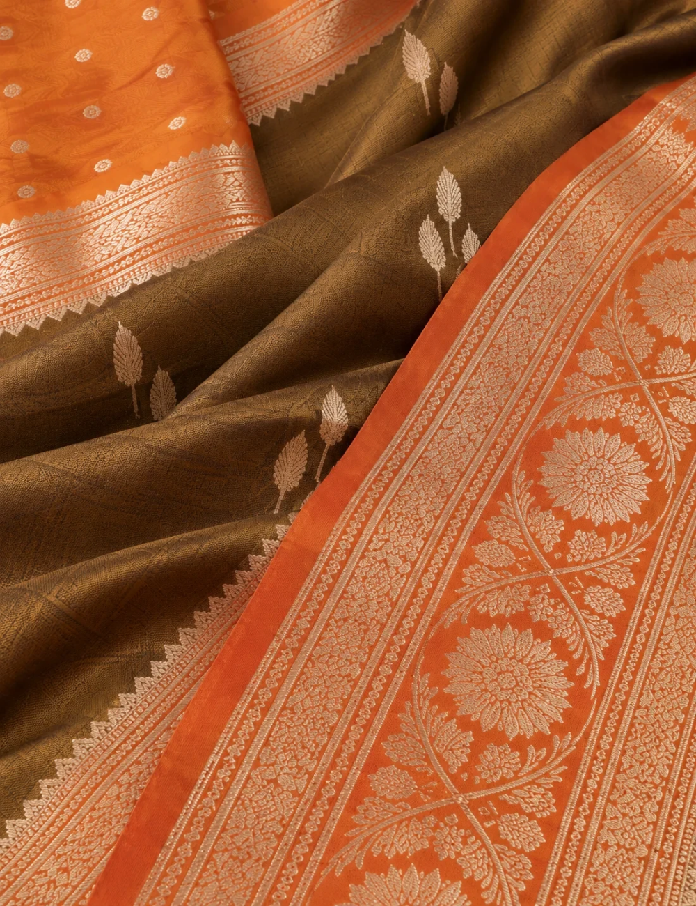 House Of Paramya olive gold tissue silk saree with shimmering nature-inspired motifs and a floral zari border