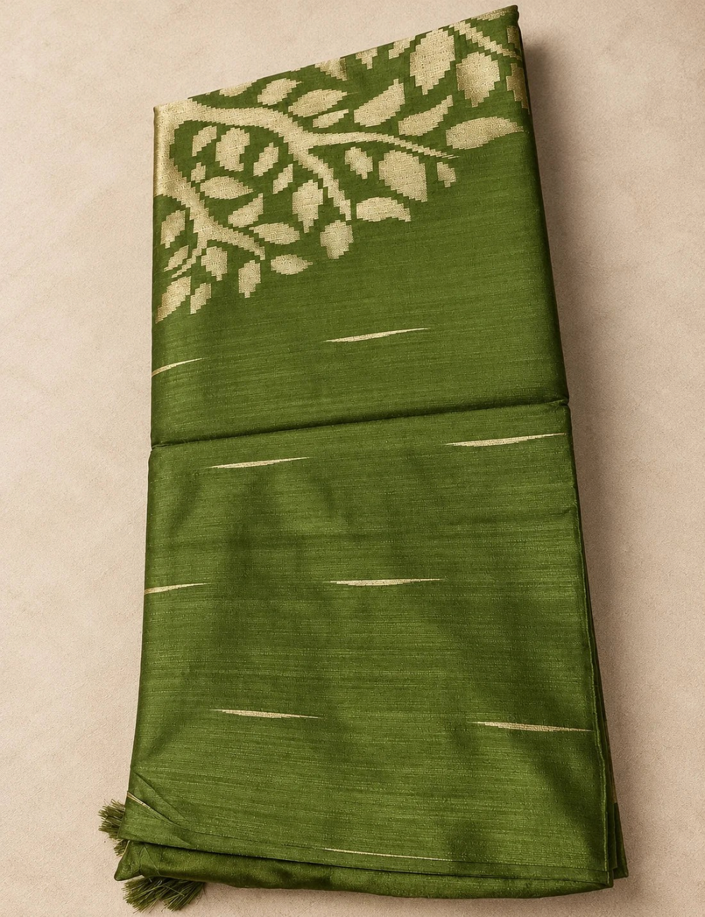 House Of Paramya green raw tussar silk saree with woven gold zari leaf motifs and subtle horizontal zari accents