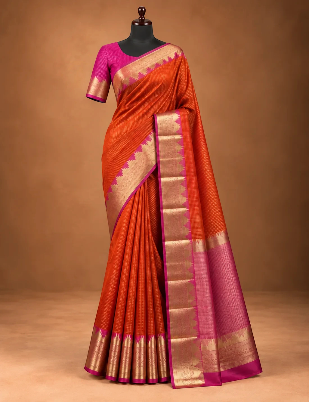 House Of Paramya orange Mysore crepe silk saree with gold zari temple border, pink pallu, and checkered weave.