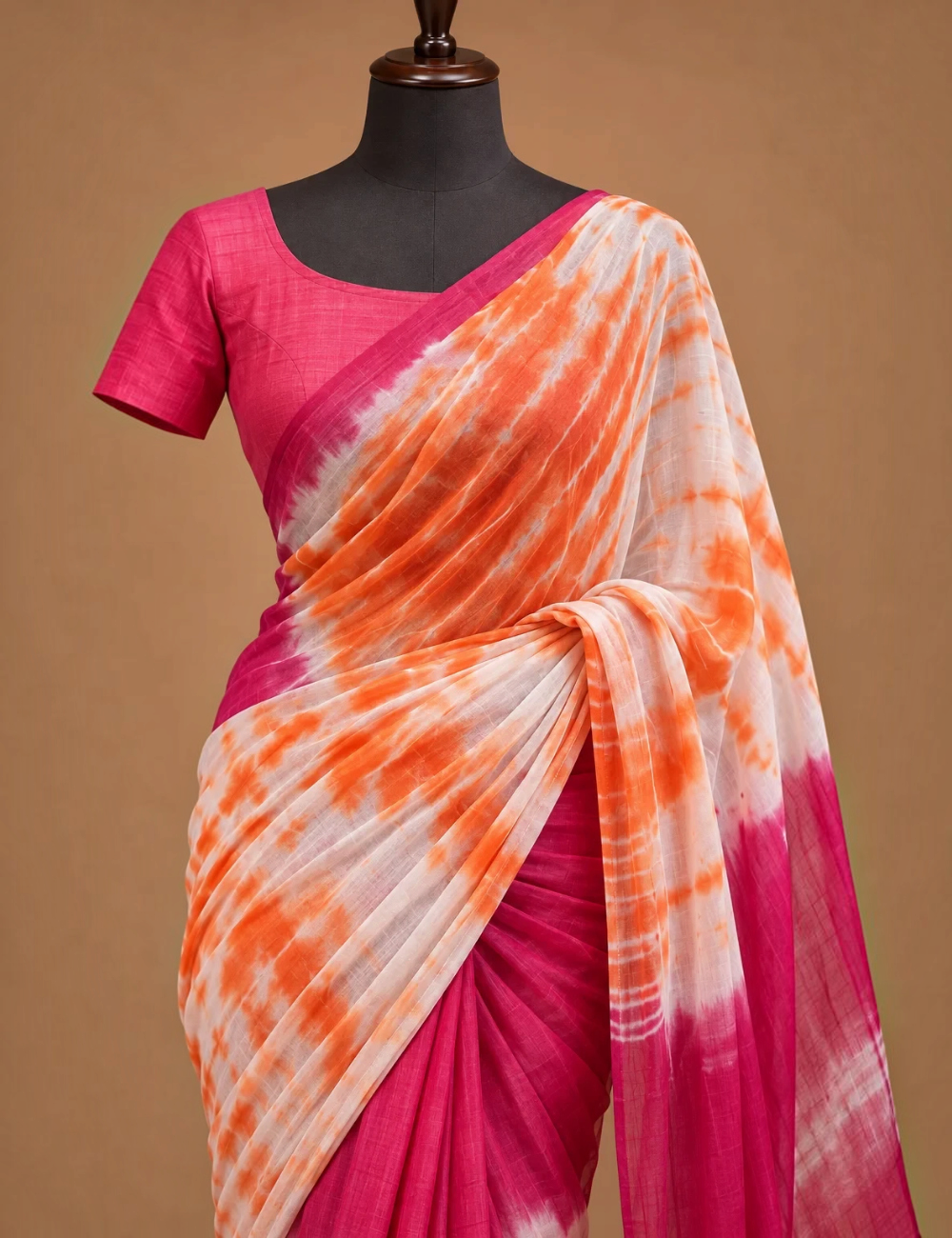 House Of Paramya linen cotton saree featuring an orange and white shibori tie-dye print with a magenta color-block.