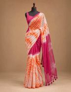 House Of Paramya linen cotton saree featuring orange and white shibori tie-dye print with magenta color-block border