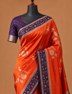 House Of Paramya orange and deep purple satin silk saree with woven Meenakari floral motifs and contrast zari border.
