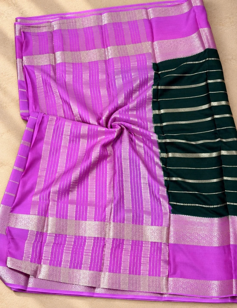 House Of Paramya orchid pink crepe silk saree featuring silver zari stripes and a traditional woven zari border