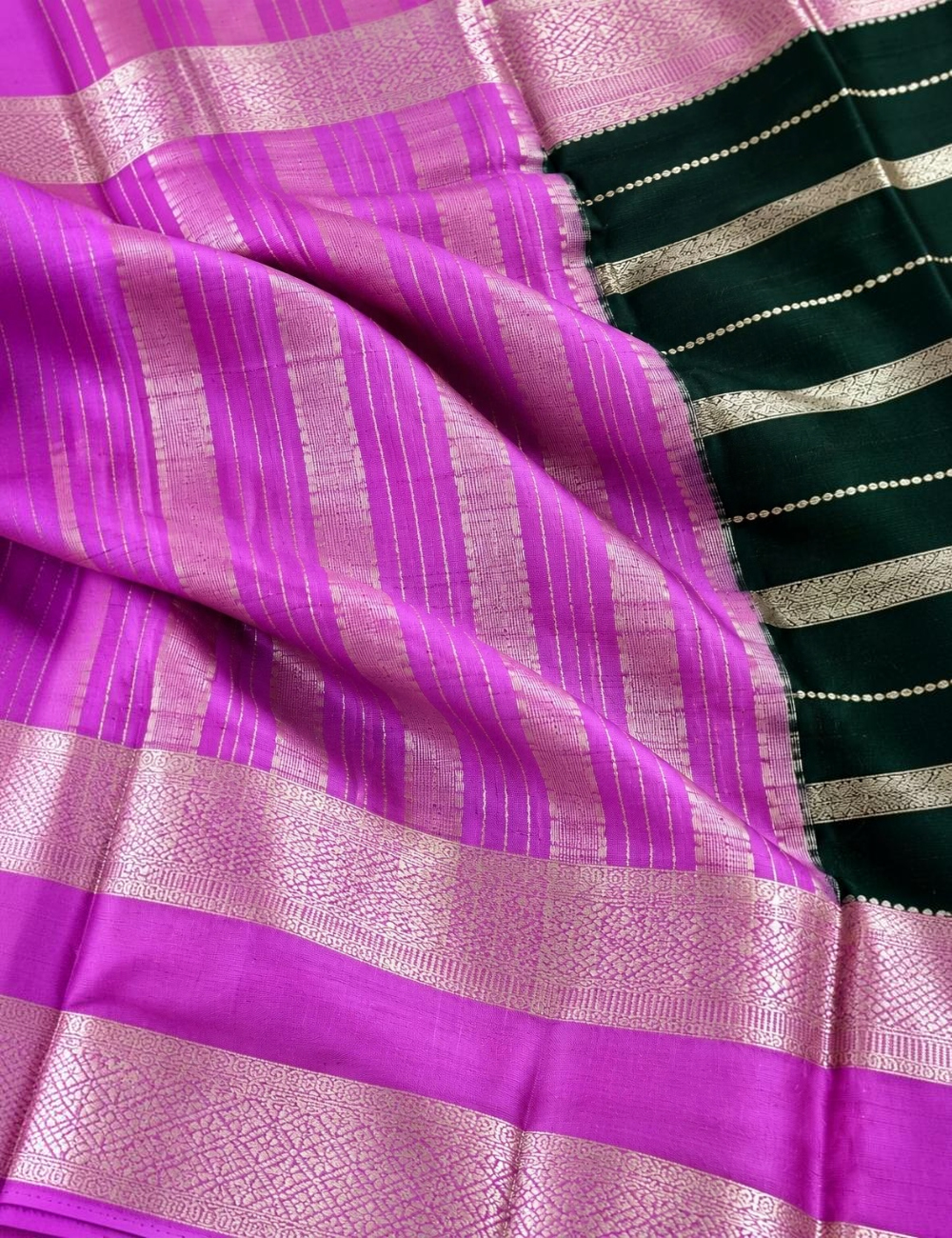 House Of Paramya orchid pink crepe silk saree featuring silver zari stripes and a traditional woven zari border