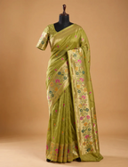 House Of Paramya parrot green Paithani silk saree with multicolor floral zari pallu and gold zari border on mannequin