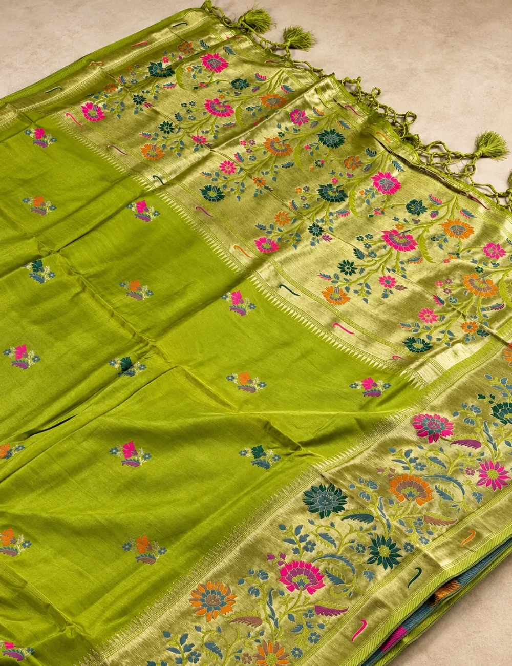 House Of Paramya parrot green Paithani silk saree featuring multicolor floral zari pallu and gold zari border.