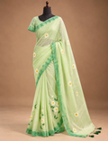 House Of Paramya pastel green linen cotton saree with white daisy floral print and dark green gold-edged border