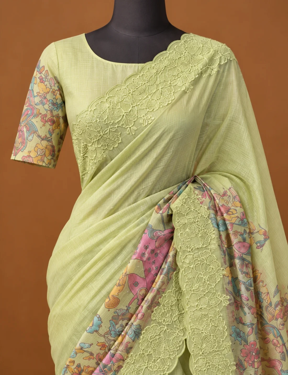 House Of Paramya pastel green Kota silk saree featuring digital multicolor prints and a scalloped lace border.