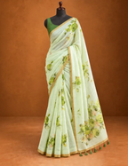 House Of Paramya pastel green linen cotton saree featuring a tonal monochrome rose print and a borderless finish.