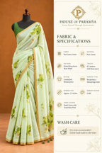 House Of Paramya pastel green linen cotton saree featuring a tonal monochrome rose print and a minimal gold border.
