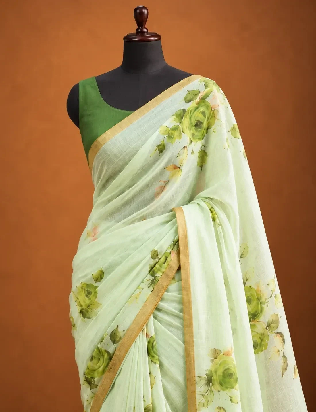 House Of Paramya pastel green linen cotton saree featuring a tonal monochrome rose print and a borderless finish.