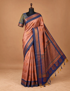 House Of Paramya sapota peach soft silk saree with royal blue border, copper zari floral motifs, and teal blue blouse.