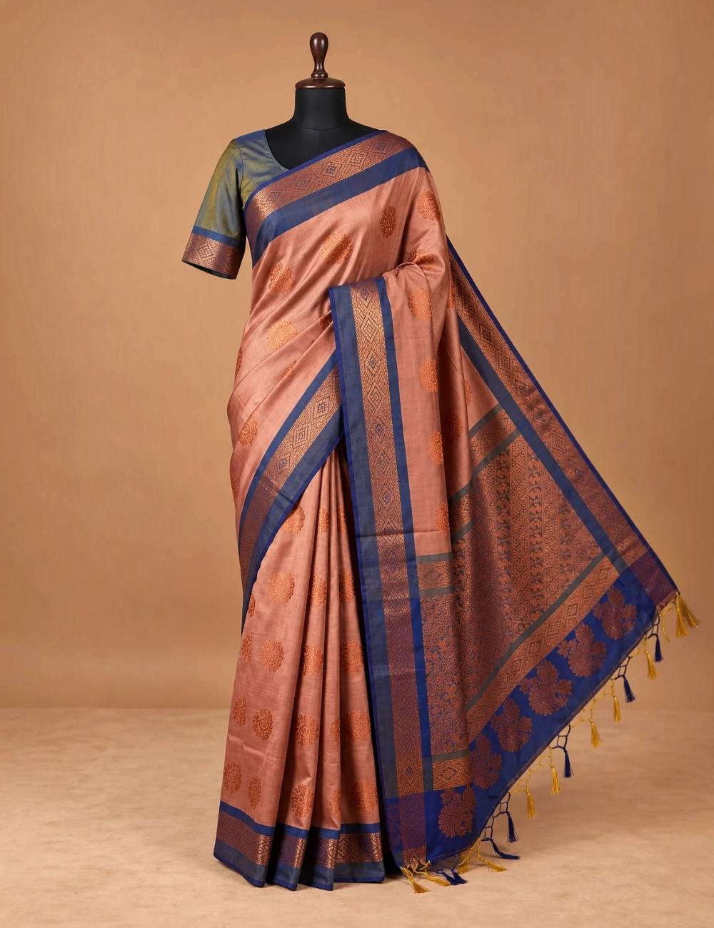 House Of Paramya sapota peach soft silk saree with royal blue border, copper zari floral motifs, and teal blue blouse.
