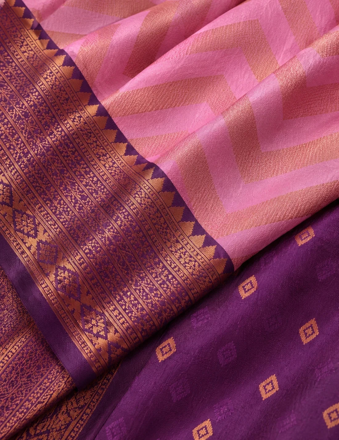 House Of Paramya pink semi Kanchipuram silk saree featuring a woven chevron pattern and purple-maroon leaf motif border