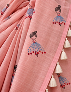 House Of Paramya powder pink linen cotton saree featuring a whimsical doll print and cream tassel border detail.