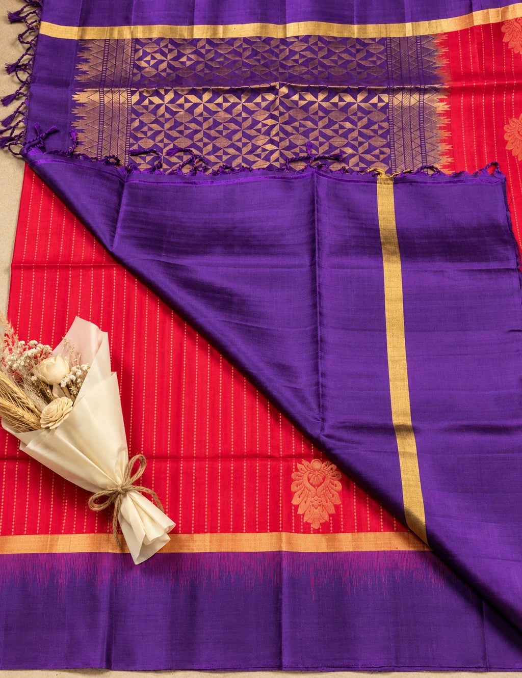 House Of Paramya pink Kanchipuram silk saree with purple zari border and pallu, featuring elegant gold motifs.