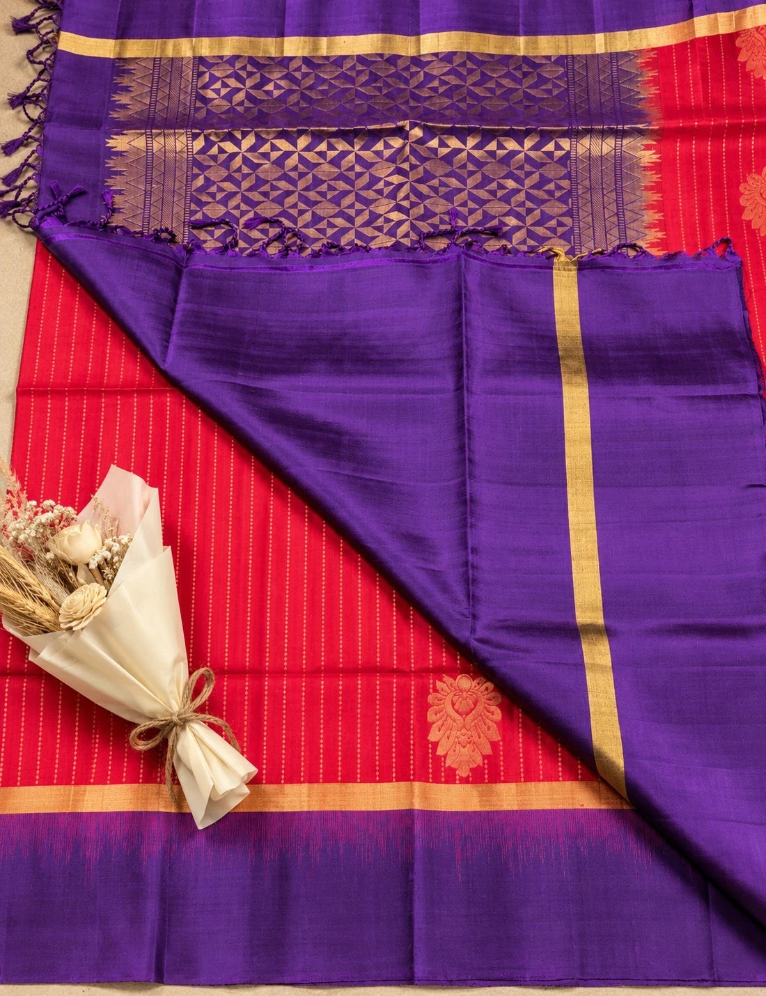 House Of Paramya pink Kanchipuram silk saree with purple zari border and pallu, featuring elegant gold motifs.