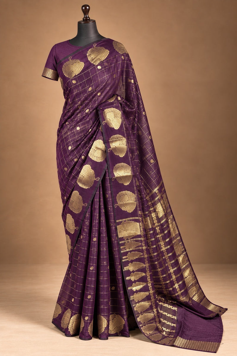 House Of Paramya plum raw silk saree featuring gold zari checks and intricate floral butta motifs on a mannequin.