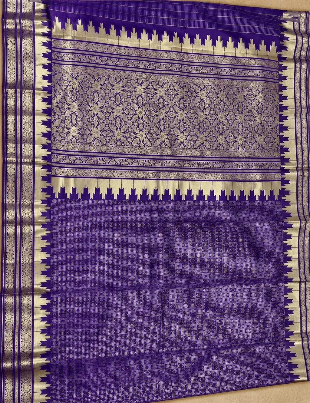 House Of Paramya purple Banarasi silk saree featuring a self-toned diamond lattice weave and silver temple border.