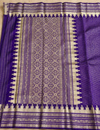 House Of Paramya purple Banarasi silk saree featuring a self-toned diamond lattice weave and silver temple border.