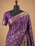 House Of Paramya deep purple Mysore crepe silk saree featuring gold woven checks, mandala motifs, and a zari border.