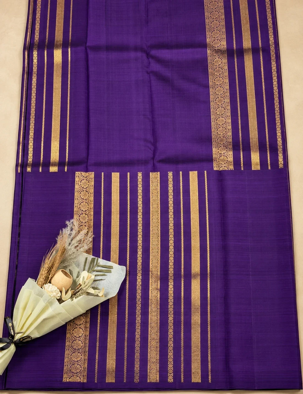 House Of Paramya dark purple Kanchipuram silk saree with intricate silver zari stripes and traditional border