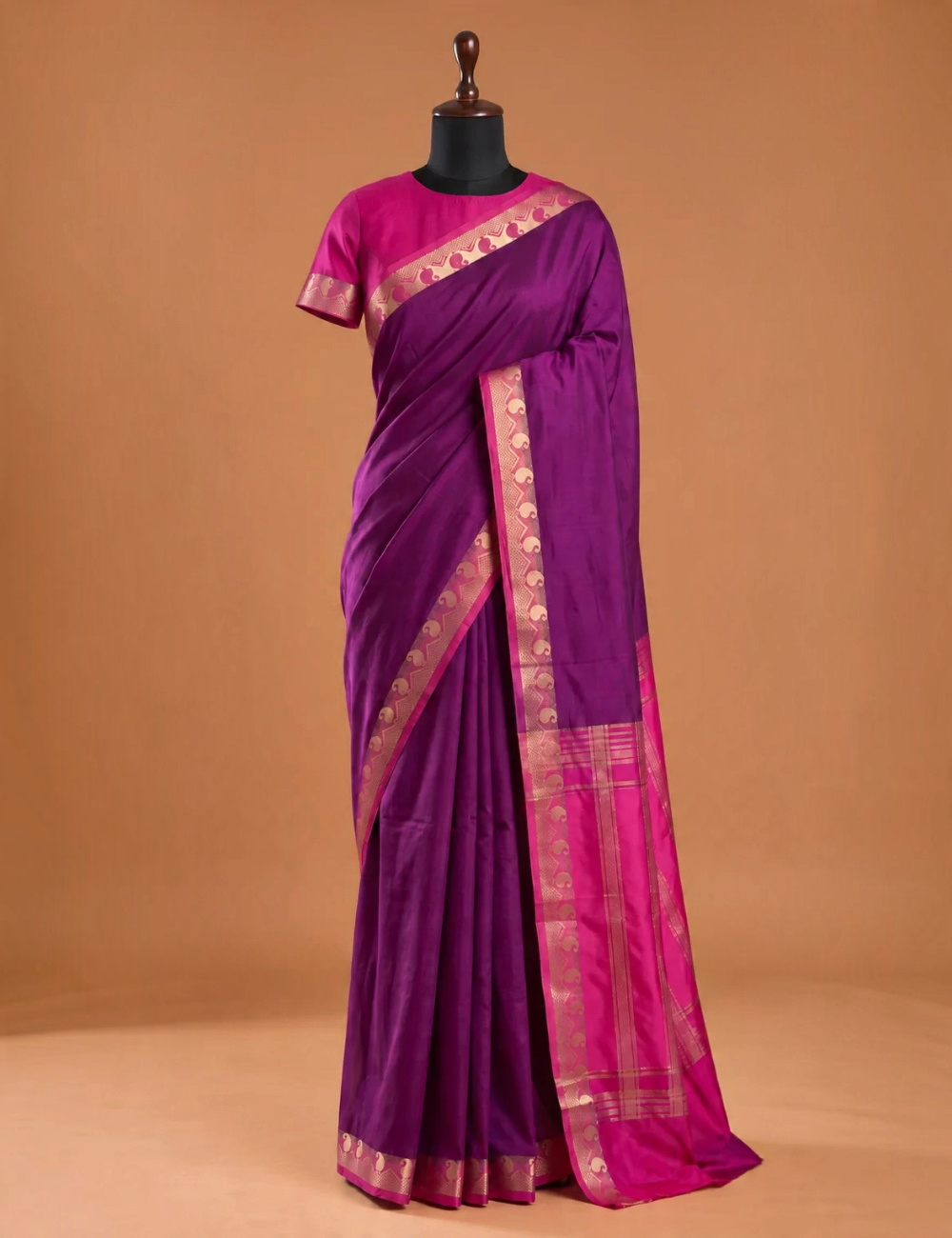 House Of Paramya purple Mysore silk saree with a plain body, contrast pink zari border, and peacock motif details.