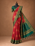 House Of Paramya red semi Kanchipuram silk saree with gold floral jaal, bottle green pallu, and ornate zari border.