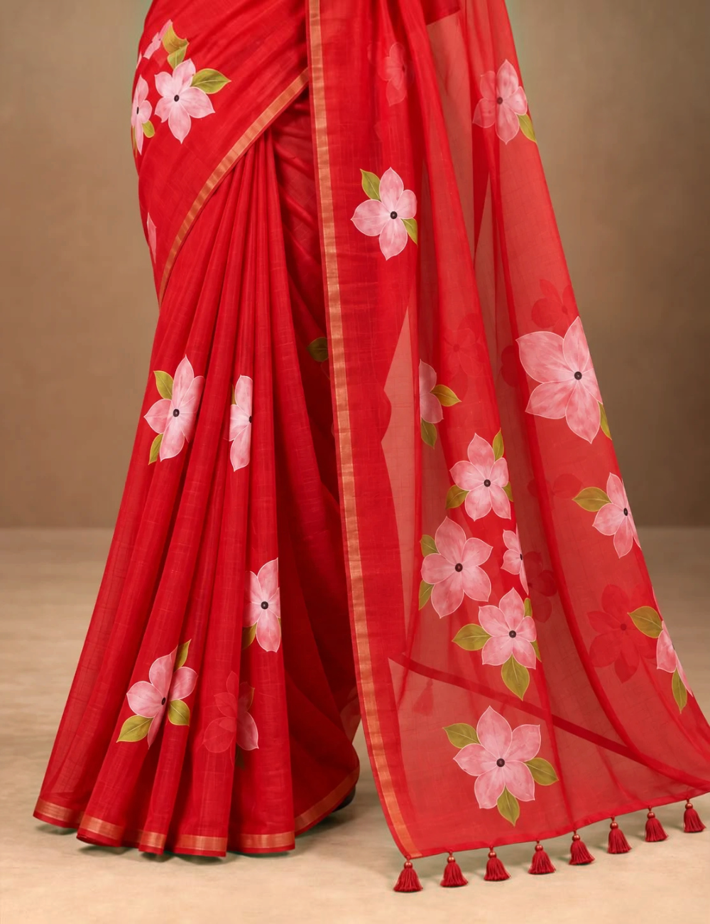 House Of Paramya red linen cotton saree featuring a pink floral print and a shimmering gold striped border