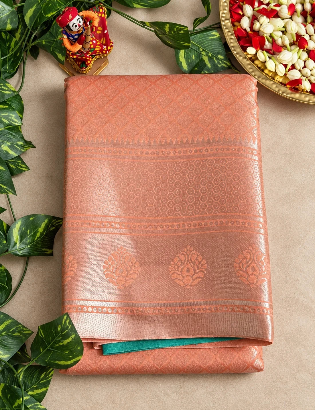 House Of Paramya rose gold Banarasi silk saree with diamond lattice pattern and woven paisley border with temple edge
