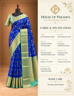 House Of Paramya royal blue semi Kanjivaram silk saree with checkered weave, floral butis and turquoise-gold border.