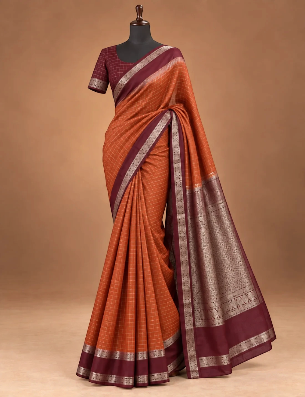 House Of Paramya rust orange Mysore silk saree with deep brown border and intricate silver zari geometric pattern.