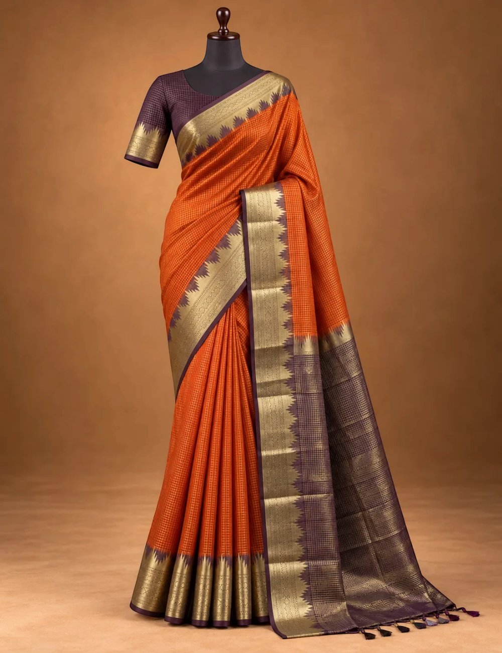 House Of Paramya rust orange Mysore crepe silk saree with a charcoal-brown pallu and gold zari scalloped temple border