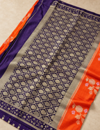 House Of Paramya orange and deep purple satin silk saree with woven Meenakari leaf motifs and contrast zari border.