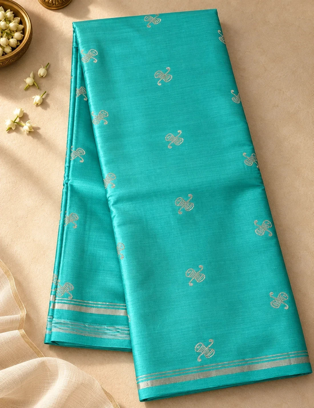 House Of Paramya light sea green Gajji silk saree with traditional gold Damarukkam motifs and elegant border