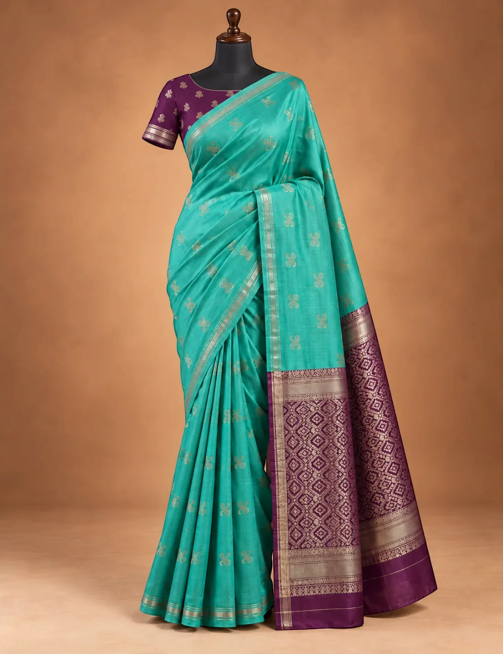 House Of Paramya light sea green Gajji silk saree with wine pallu, traditional Damarukkam motifs, and floral blouse.