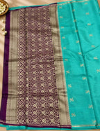House Of Paramya light sea green Gajji silk saree with rich wine pallu featuring intricate traditional woven motifs